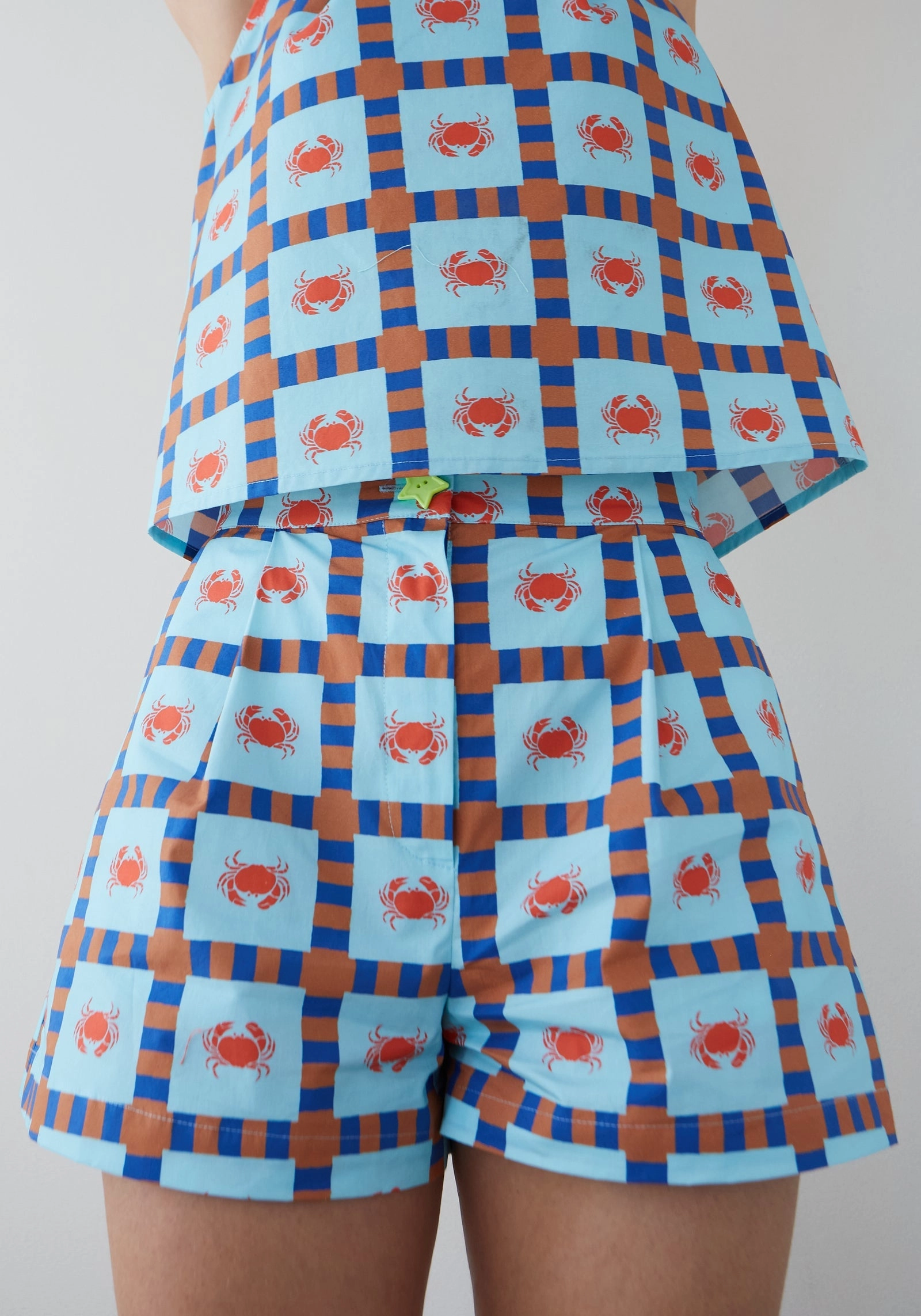clean design Full Coverage Ana Crab Short in Turq/Red