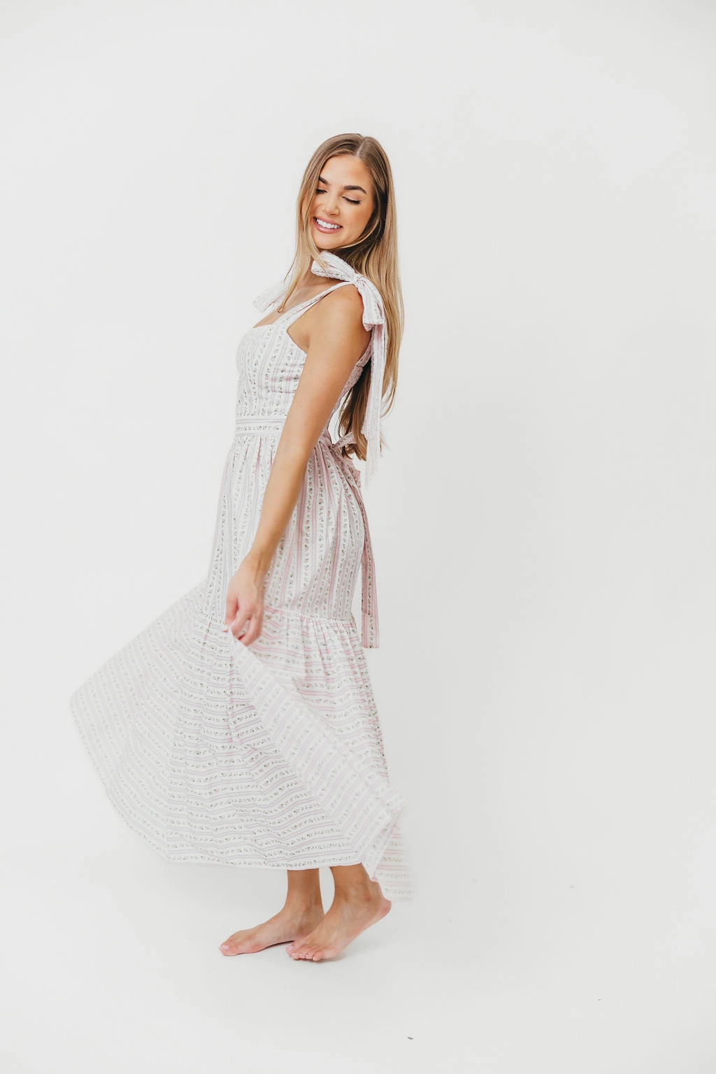 Playful design piece Cool Movement Garcelle Floral Tiered Midi Dress in Pink *Final-Sale*