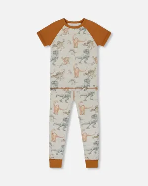 Organic Cotton Two-Piece Short Sleeve Top And Pant Pajama Set Dinosaur On Mottled And Tan Background